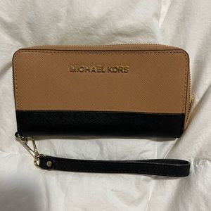 Small Michael Kors wallet zip around brown black wrist holder like new